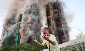 Fire engulfs high-rise buildings in Hong Kong, killing at least 36